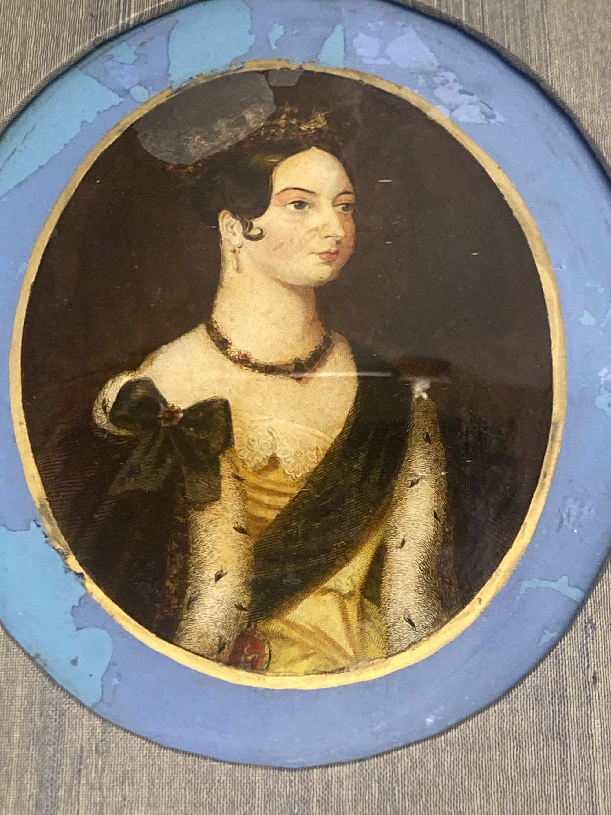 An oval reverse print on glass of Queen Caroline?, frame 33.5cm high